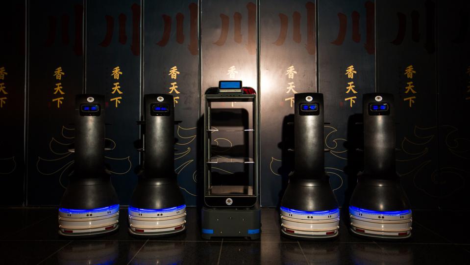 The X Pot Redefines Chinese Hot Pot With Robot Servers And 5D Projections